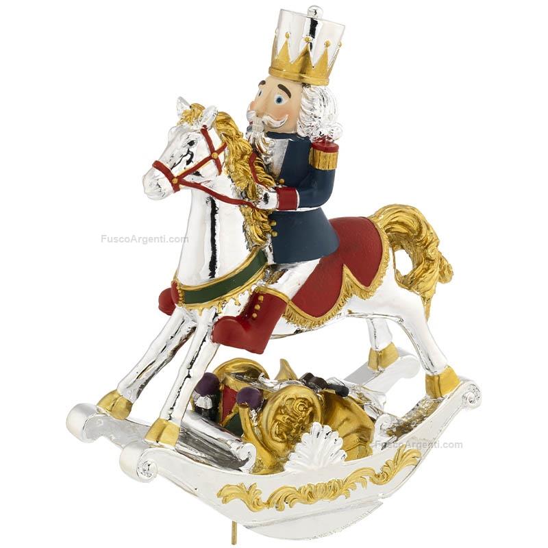 bagutta schiaccianoci su cavallo a dondolo