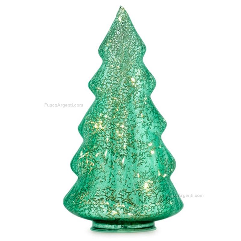 fade christmas tree with lights forest