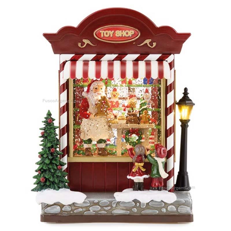 fade christmas santa's toy shop snow globe