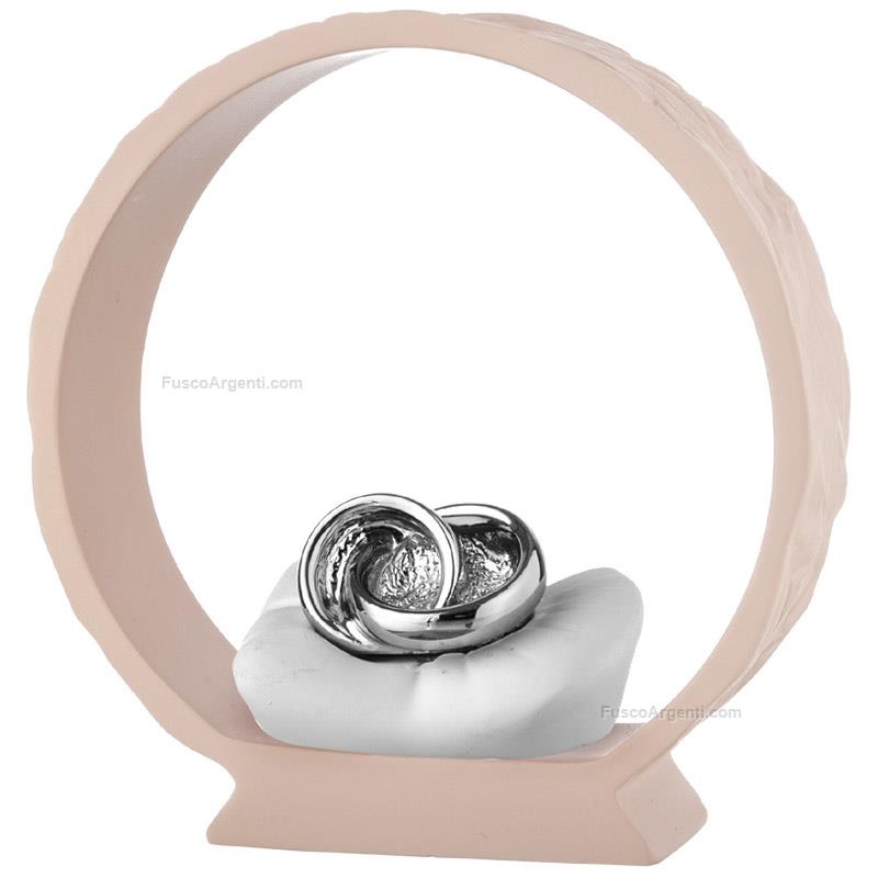 moda argenti wedding rings on powder base